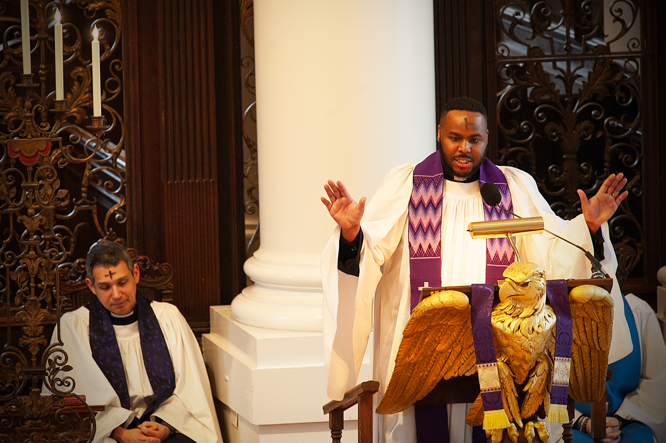 The Rev. Dr. Calvon Jones gives the benediction from the pulpit on Ash Wednesday.