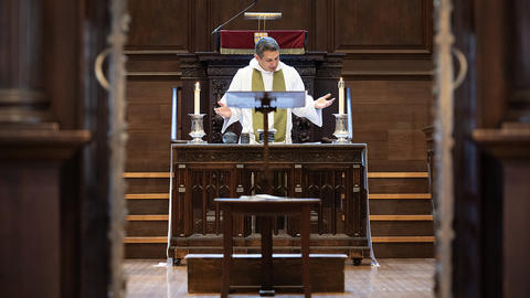 The Rev. Matthew Potts conducts Holy Communion in Appleton Chapel