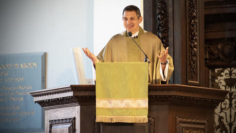 The Rev. Matthew Potts preaches from the pulpit