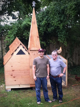 The Rev. Matthew Potts and his stepfather-in-law Petur Gudlaugsson stand in front of a chicken coop they built on Cape Cod.