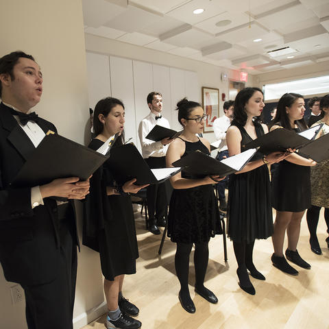 UChoir members rehearse before Carols 2017