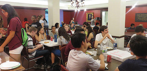 Students from the Harvard Dorm Crew enjoyed a well-deserved dinner break hosted by MemChurch in the Buttrick Room the Friday nig