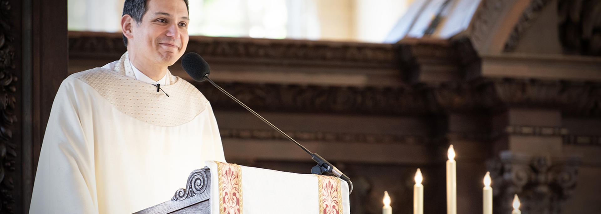 The Rev. Matthew Ichihashi Potts preaches from the pulpit of the Memorial Church