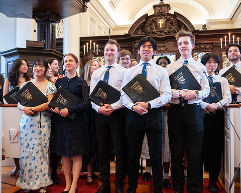 Members of the Harvard University Choir take a bow after the Arts First Concert.