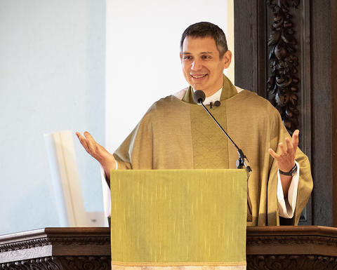 The Rev. Matthew Potts preaches from the pulpit at the Memorial Church