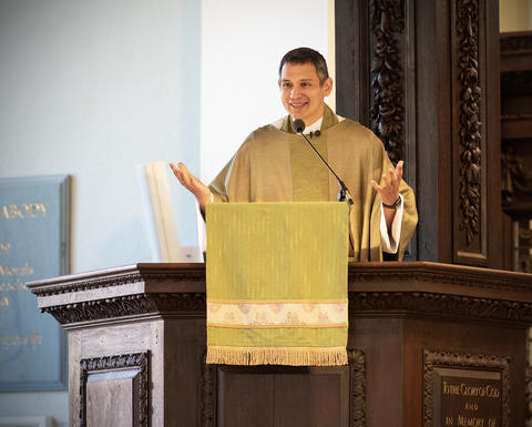 The Rev. Matthew Potts preaches from the pulpit