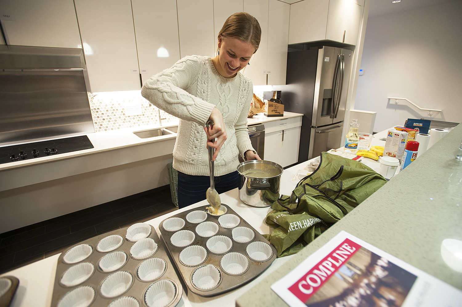Isabelle Desisio '20 bakes muffins for her team mates on the Harvard Women's Swim and Dive Team