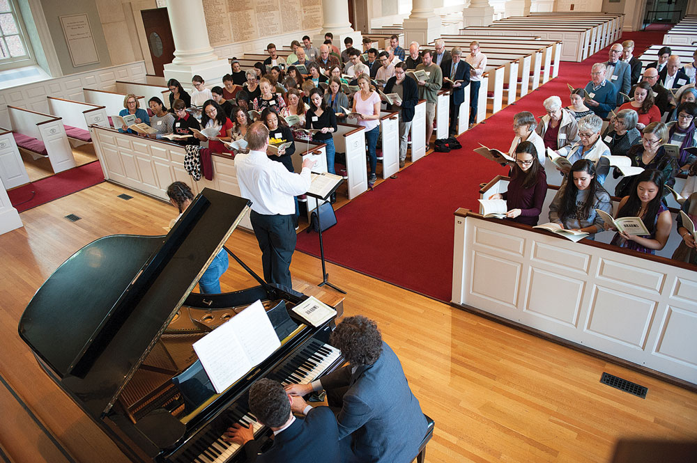 Dr. Murray Forbes Somerville leads returning UChoir alum in song