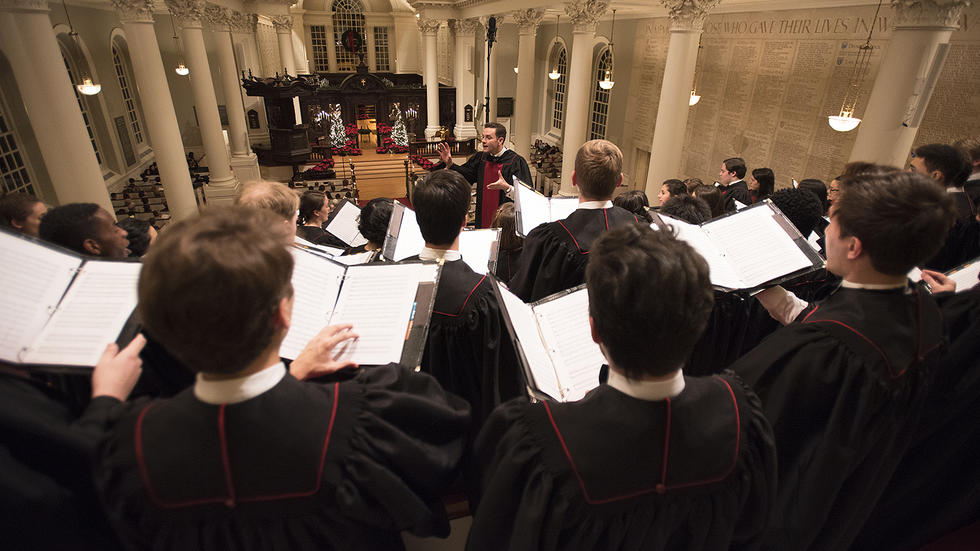 Choirmaster Edward Elwyn Jones conducts the University Choir during the 108th Annual Christmas Service.