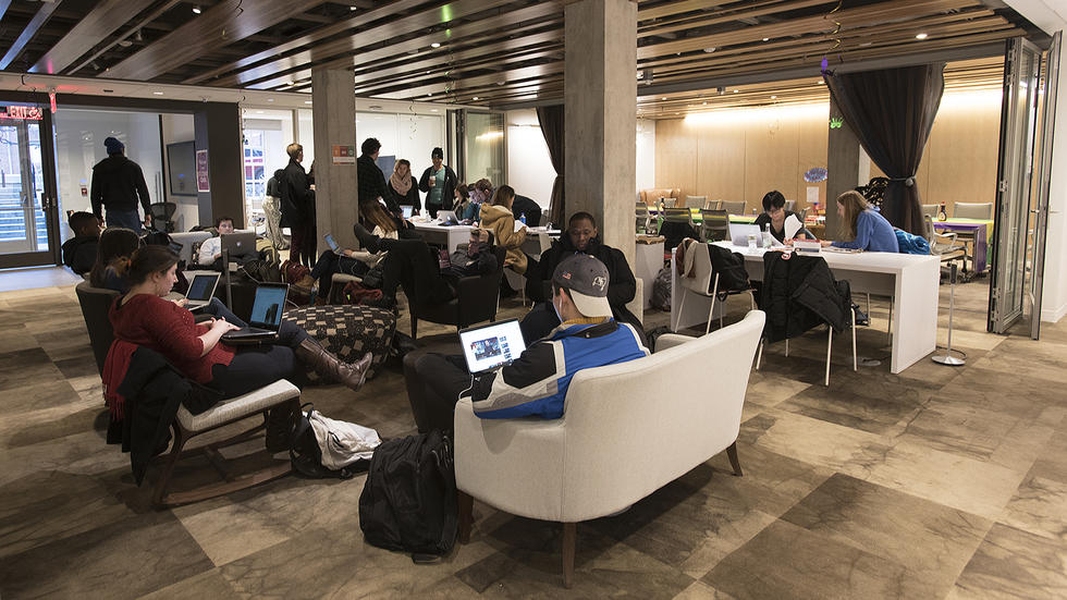 Students hunker down for study and for conversations in the Student Oasis.