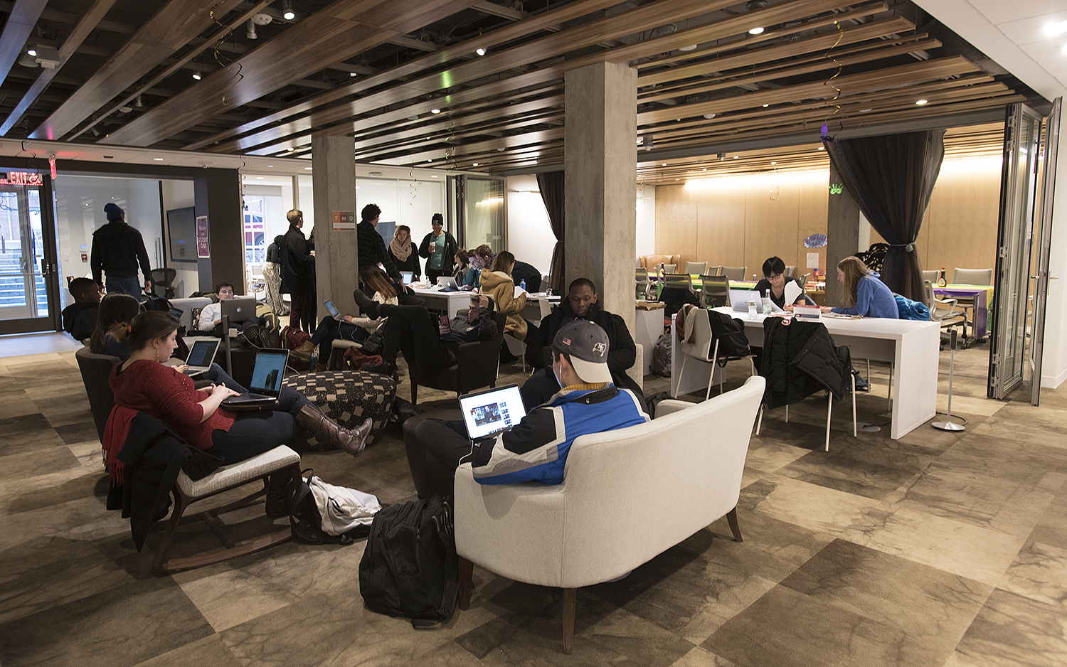 Students hunker down for study and for conversations in the Student Oasis.