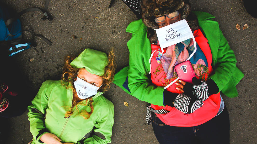 Students lie in front of the Memorial Church